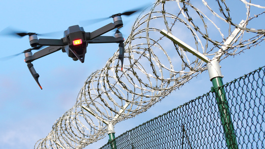drone barbed wire fence prison - Credit: Shutterstock