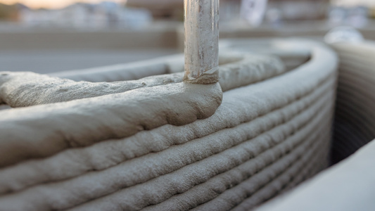 A quick-setting, low-carbon alternative to concrete could speed up the 3D printing of buildings and infrastructure, according to a new study. - Uncredited