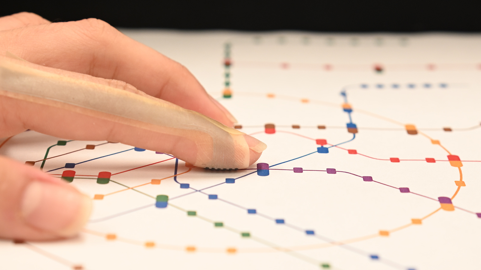 Fingertip wearable brings lifelike texture to flat digital interfaces - Uncredited